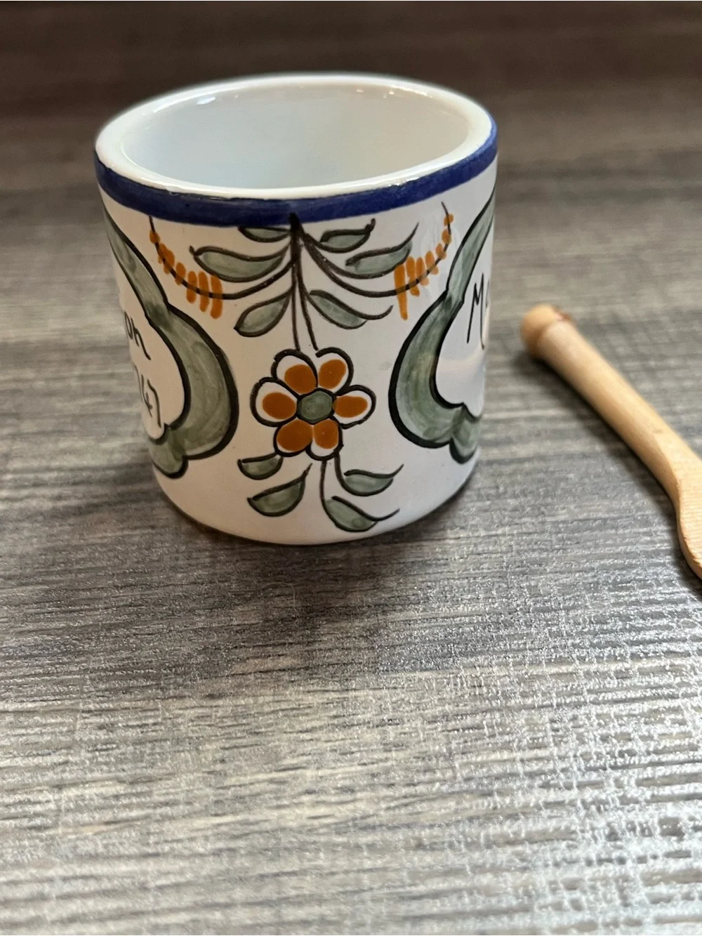 Small homemade French hand painted mustard jar with wooden spoon. Ceramic